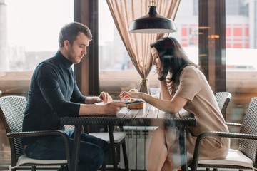 Couple at restaurant having dinner