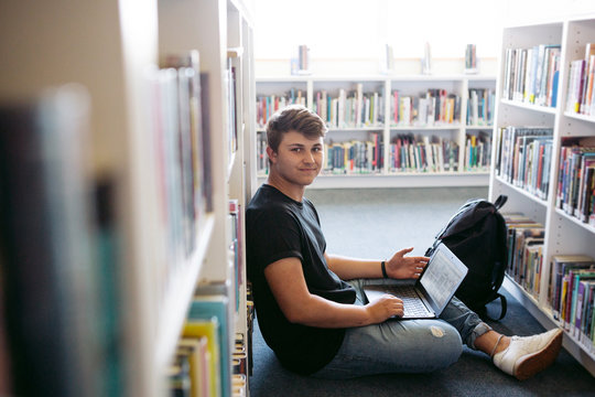 Highschool teenager student studying in library