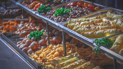 hot food line. street food. grilled vegetables. food fair