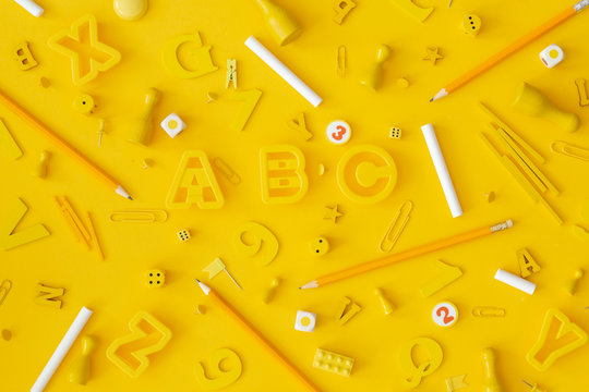 School objects on yellow background