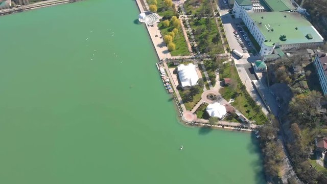 Quay Abrau Durso, a popular place for weddings. The village on the shore Calm, blue sky. Filming with drone. Beautiful futage
