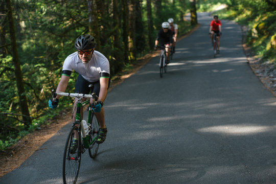 Group road bike ride in nature