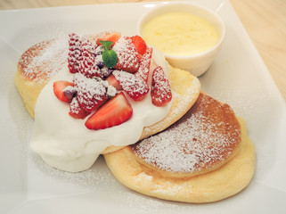 Strawberry Cheese Souffle Pancakes with Fondue. 
