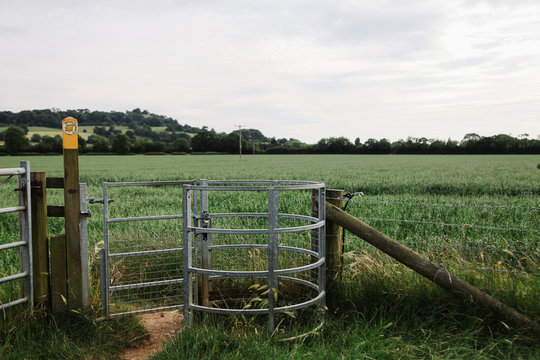 single person gate used for public walkways through fields