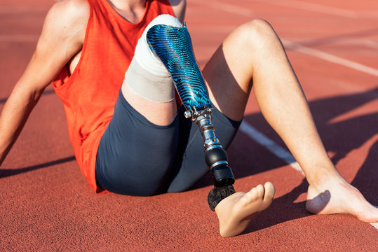Portrait of disabled man athlete with leg prosthesis