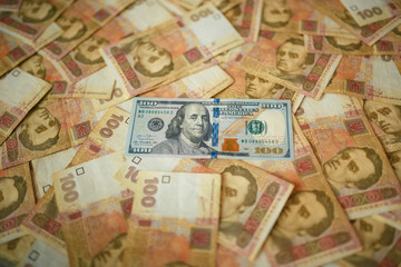 dollars euro hryvnia banknotes background, close up