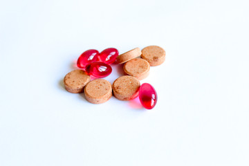 multicolored tablets, vitamins, medicines