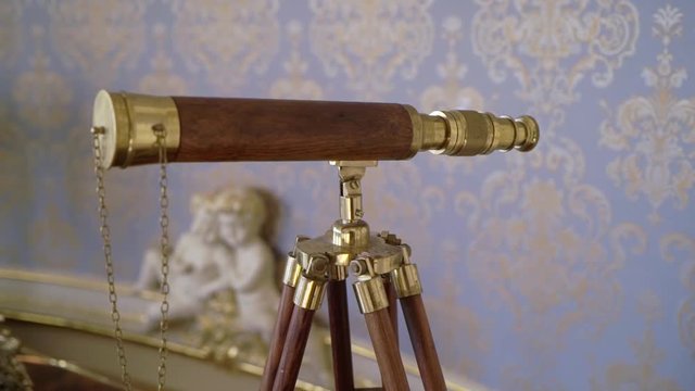 Old telescope antique indoors in apartment