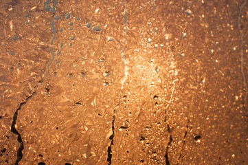 Abstract background with place for text. Drops on glass, orange and yellow bokeh