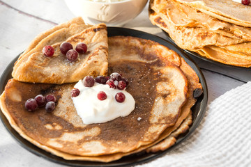 pancakes with cranberries and sour cream, pancakes with berries