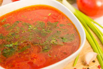plate of borscht with greens, soup