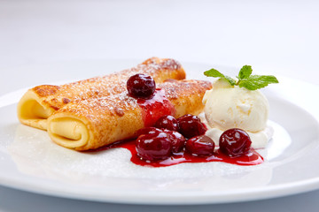 sweet pancakes with cherries