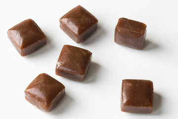 Dutch coffee candy cubes called Haagse Hopjes, against white background