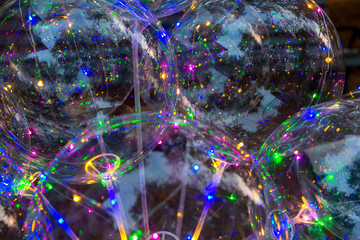 Multi-colored luminous led bulbs. Colorful background of glowing balls. Led balls for holidays....