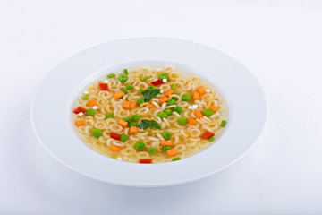 vegetable soup on a white table