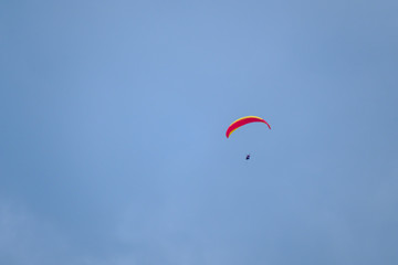 Tandem paragliders flying in the sky