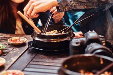 Eating traditional asian food