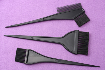 barbershop tools on pink felt background. top view