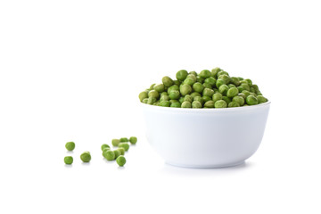 Green peas in a white bowl isolated on white background. Copy space