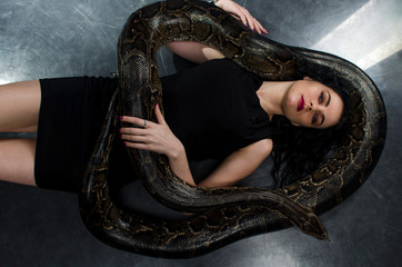 sensual sexy woman with python