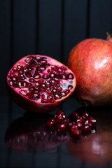 Delicious pomegranate seeds. Juicy Ripe Red Granets or Garnets.  Closeup view of Grain Red Grenades. 