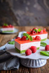 Sweet spinach cake with raspberry mousse and layer of jelly