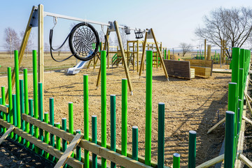 Fototapeta na wymiar building a modern childrens playground in the city