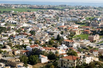 Fototapeta na wymiar Landscape from a hill looking Voroklini village in Cyprus and blue sky