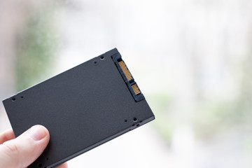 solid state drive ssd at light abstract background. empty.