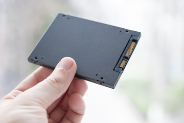 solid state drive ssd at light abstract background. empty.