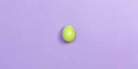 Decorated Easter eggs holiday theme on a purple background