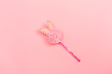Easter bunny holiday ornament object on a pink background