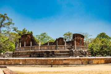 Naklejka premium The sacred quadrangle with buddha, ancient ruins in Polonnaruwa in Sri Lanka