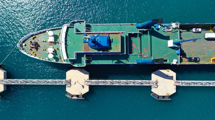 Fototapeta na wymiar Aerial top view photo of passenger ship docked in mediterranean port