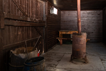 old rusty coal stove for railway car heating
