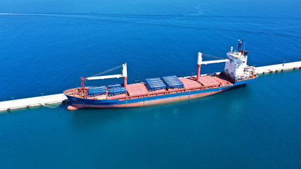 Aerial drone photo of industrial cargo tanker docked in mediterranean port