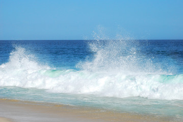 Wonderful splash waves on beach
