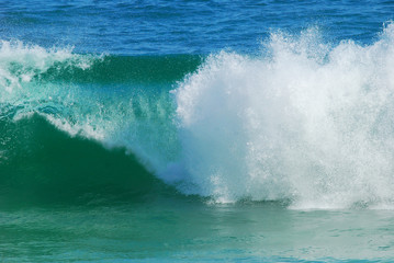 Waves breaking on the beach