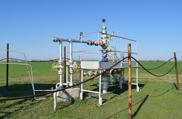 Fototapeta na wymiar The equipment and technologies on oil fields. Oil well