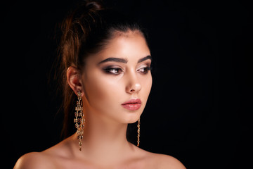 Classic close up vogue beauty portrait with professional make up and hairstyle beautiful girl in studio lights.
