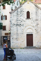 Fototapeta na wymiar Old stone buildings on narrow streets of medieval towns.