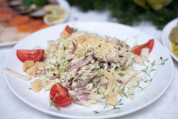 Tuna salad with lettuce, eggs and tomatoes.