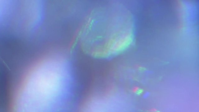 Psychedelic defocused background, vintage mood, gently bokeh, stylish light particles. 4k.