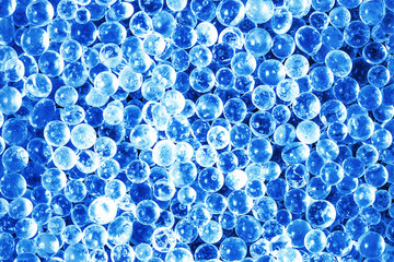 Blue crystal spherical balls pattern. Abstract round bubbles glowing magicly.	