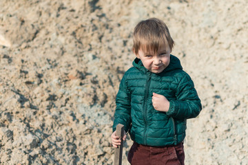 Little boy on a sunny day in the sands.