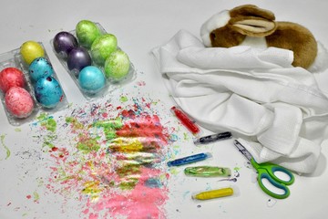 Easter tradition paint eggs. Eggs and paint on the work surface after completion of the work.