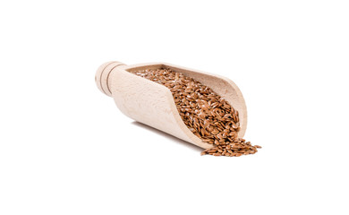 flax seed  in wooden scoop isolated on white background. nutrition. bio. natural food ingredient.front view.
