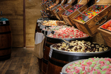 Sugar candy shop display with different sweets and candies