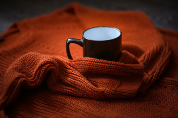 Autumn knitted sweater and cup of coffee,cozy