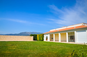 Fototapeta na wymiar Villa near orange garden in Peloponnese peninsula, Greece.